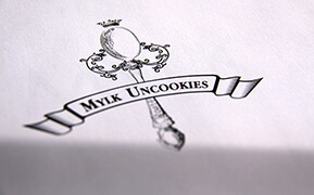 Mylk Uncookies. Brand Identity Design. Signage. Stationary and Shopping Bags Design.
